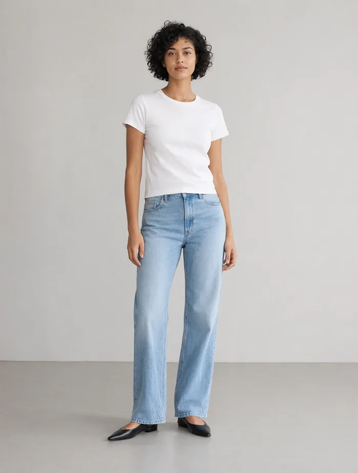 Reference photo of a woman in a white t-shirt and jeans